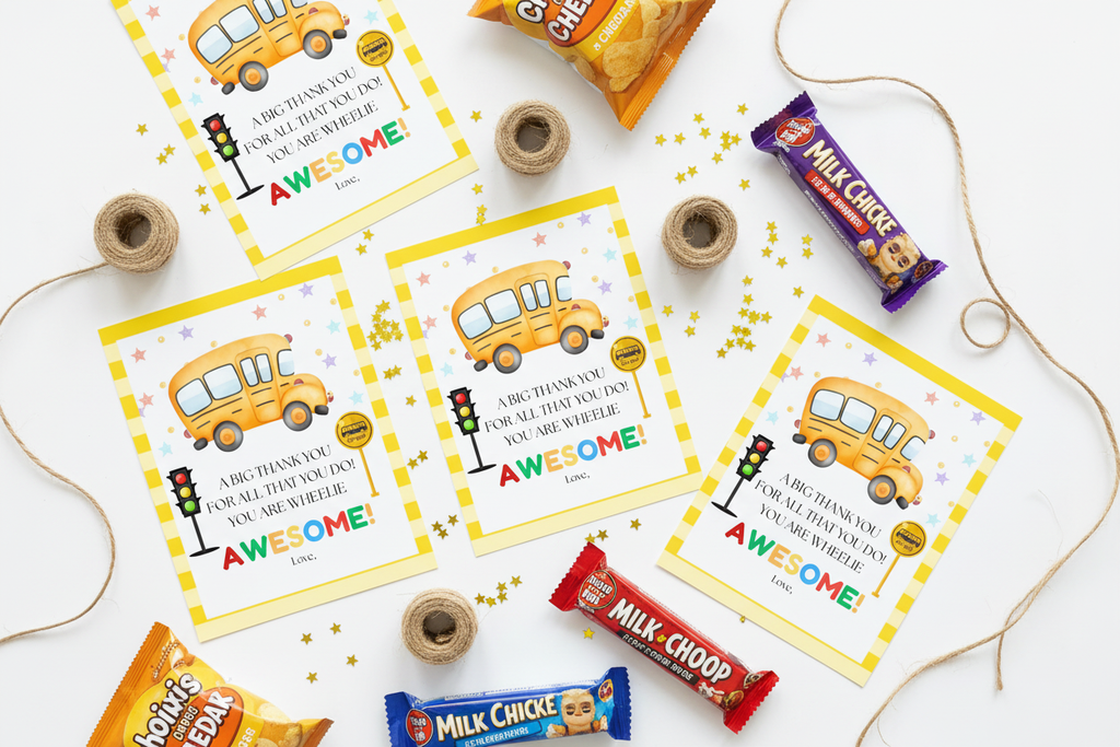 You Are Wheelie Awesome printable gift tags flat lay with candy bars, twine, and colorful star confetti on white surface
