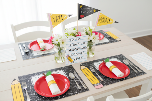 Full back to school breakfast table setup with banner and centerpieces