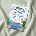 O-Fish-Ally fishing birthday invitation mockup — lake scene with rowboat, cattails, jumping fish and Gone Fishing sign