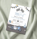 Two Fast racing second birthday invitation mockup — vintage blue race car with checkered flags and bunting banners